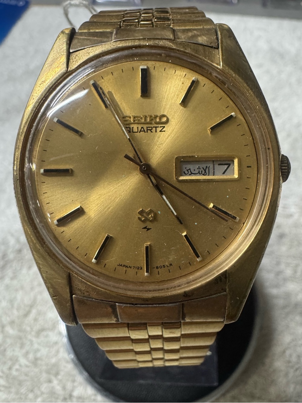 Seiko Gold Tone Quartz Watch with Day-Date